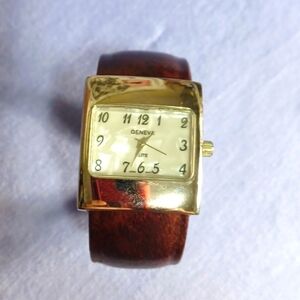 GENEVA WRIST WATCH WITH A BANGLE TYPE BAND